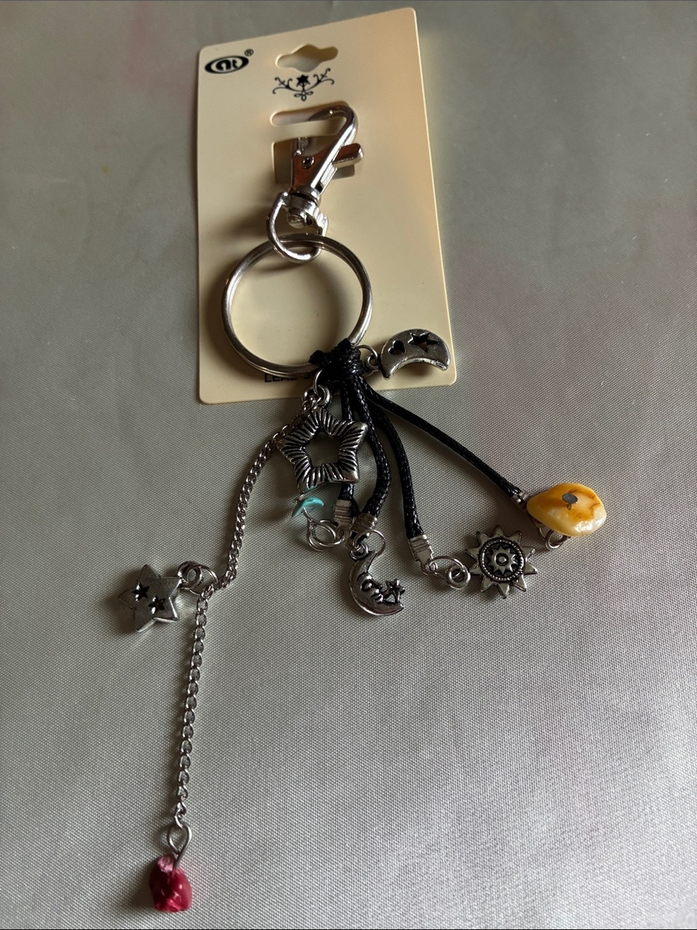 Silver Multi-Charm Star & Moon Keychain with Yellow Accent